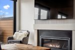 Cozy up next to the beautiful gas fireplace